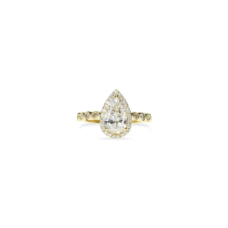 Pear Diamond Ring with Delicate Halo